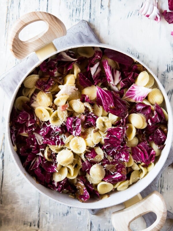 orecchiette pasta in a large pan with radicchio and pancetta