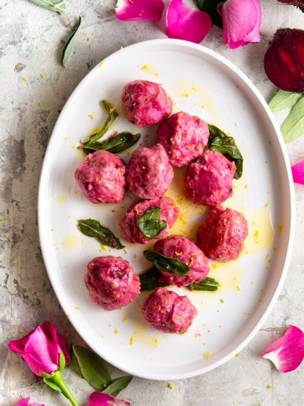 An overhead shot of beetroot ricotta gnudi