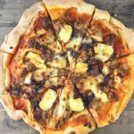 This Turkey Stuffing Pizza with Caramelised Onions and Brie recipe is the perfect way to use leftovers this holiday season. www.insidetherustickitchen.com