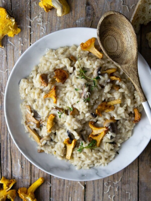 An overhead shot of creamy mushroom risotto with chanterelle mushrooms