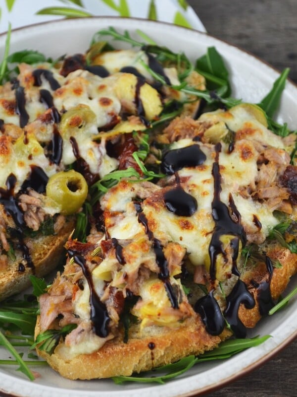 This is the best tuna melt I've ever tasted! With a Mediterranean twist of artichokes, sun dried tomatoes and olives topped with mozzarella cheese and balsamic glaze. It's so delicious you'll love it! www.insidetherustickitchen.com
