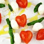 These fun Valentine's Caprese Skewers are a perfect fuss free appetizer using classic Italian ingredients you can't go wrong! www.insidetherustickitchen.com