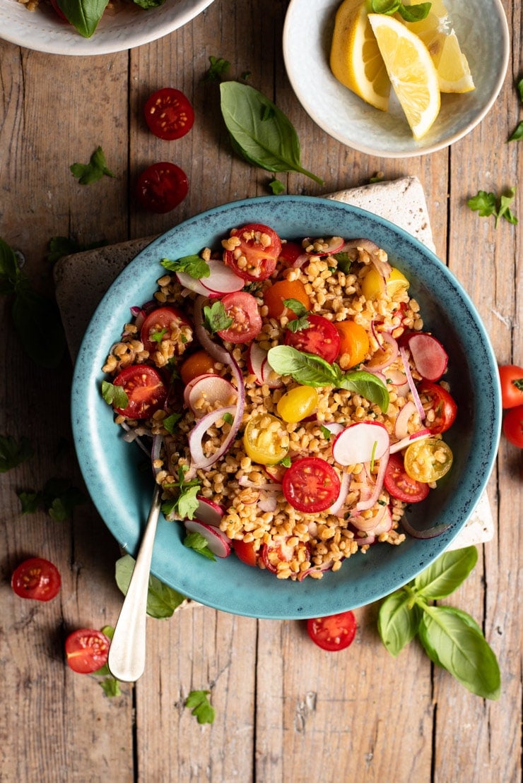 An overhead shot of an Italian farro salad in a bowl