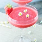 Prosecco Strawberry Slushie made with only 3 ingredients, it's the perfect way to cool down and relax this Summer! Insidetherustickitchen.com
