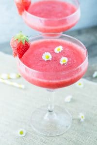 Prosecco Strawberry Slushie made with only 3 ingredients, it's the perfect way to cool down and relax this Summer! Insidetherustickitchen.com
