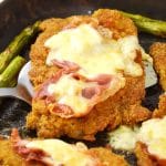 Tender veal cutlets baked with a slices of delicious prsocuitto and cheesy parmesan cream (best sauce ever) insidetherustickitchen.com