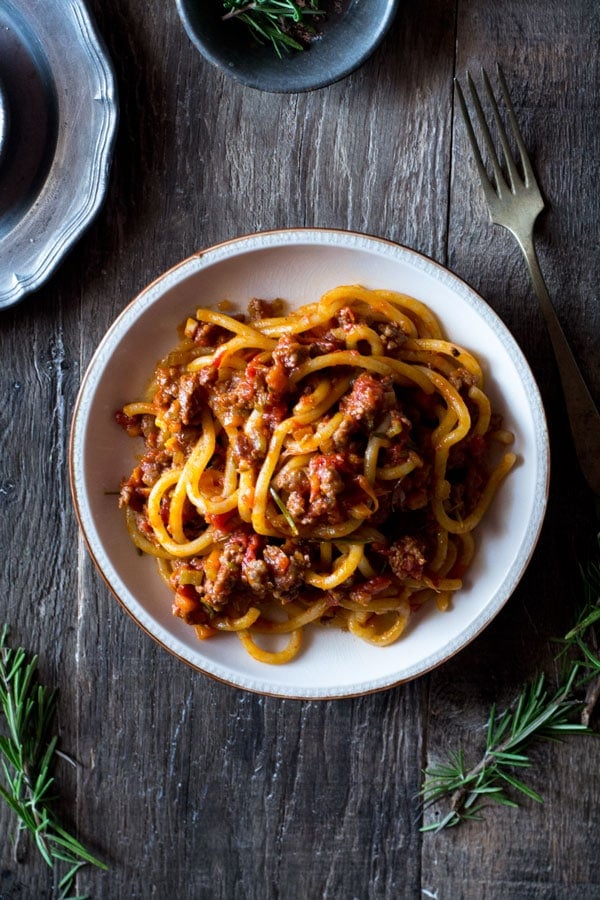 Pici-with-Tuscan-sausage-ragu-inside-the-rustic-kitchen