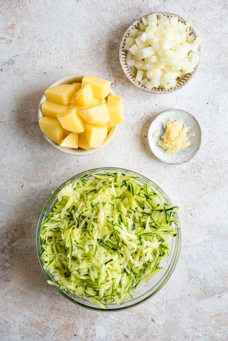 Ingredients prepped, cut and diced for making creamy zucchini soup