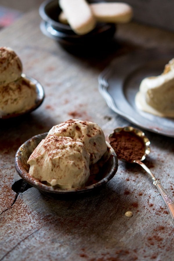 Two scoops of tiramisu ice cream in a small bowl