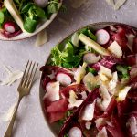 Bresaola salad with apple and radicchio. An easy Italian salad recipe with parmesan, radishes and a simple garlic, olive oil dressing. A great light lunch or starter that's packed full of delicious flavours. More authentic Italian recipes at Inside the rustic kitchen.