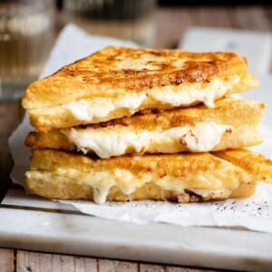 A close up image of fried mozzarela sandwiches