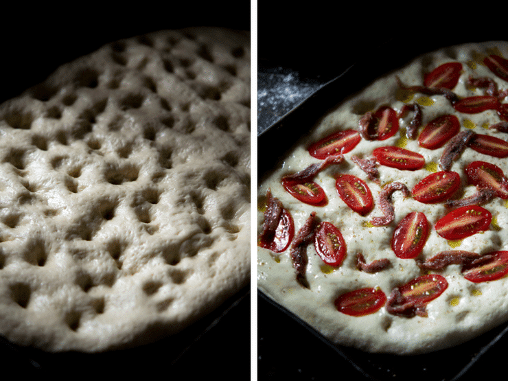 Close up of cherry tomato focaccia with anchovies before going in the oven