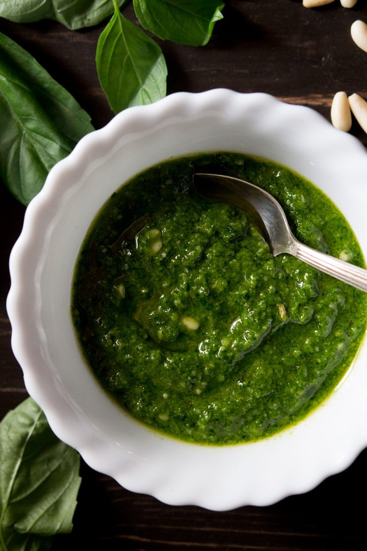 How to make basil pesto close up shot in a bowl