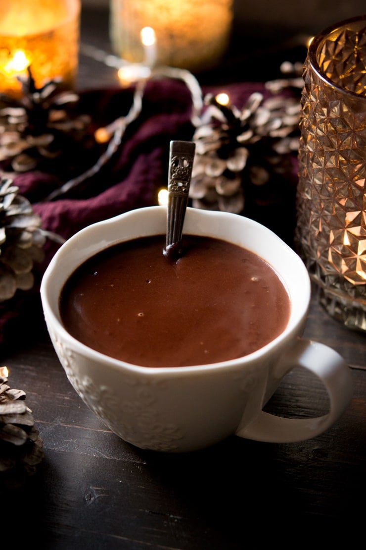 Italian hot chocolate in a white mug with a spoon