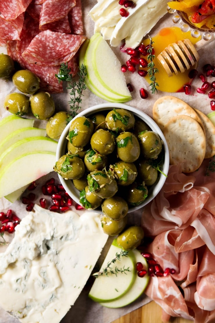 Marinated olives on a ramekin on an antipasto platter