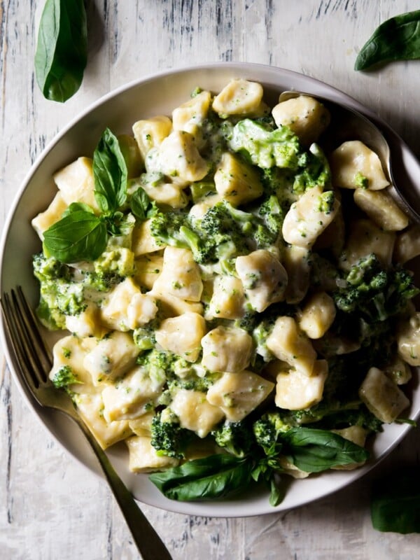 easy homemade gnocchi in a large bowl with broccoli sauce on top