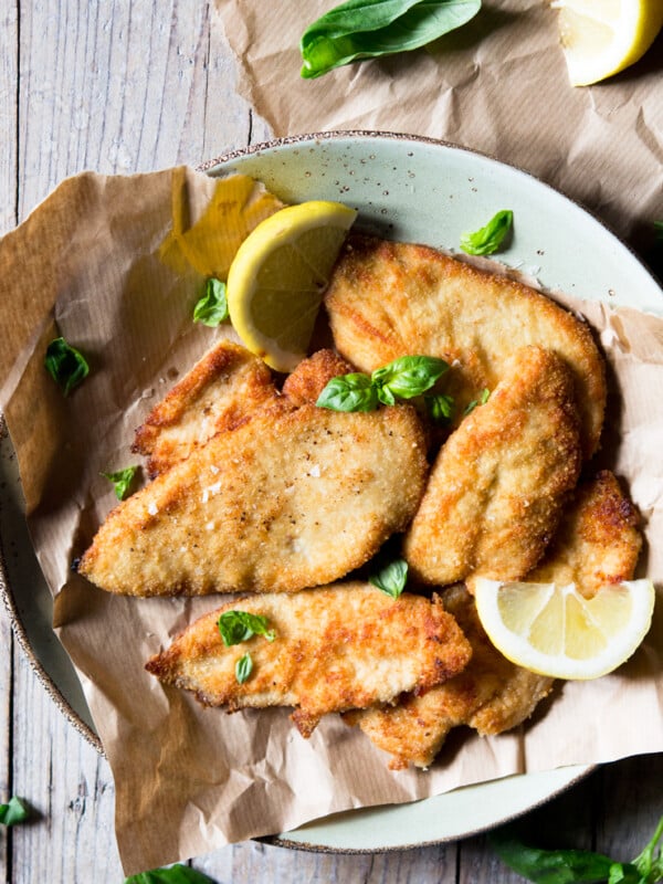 An overhead shot of breaded chicken cutlets