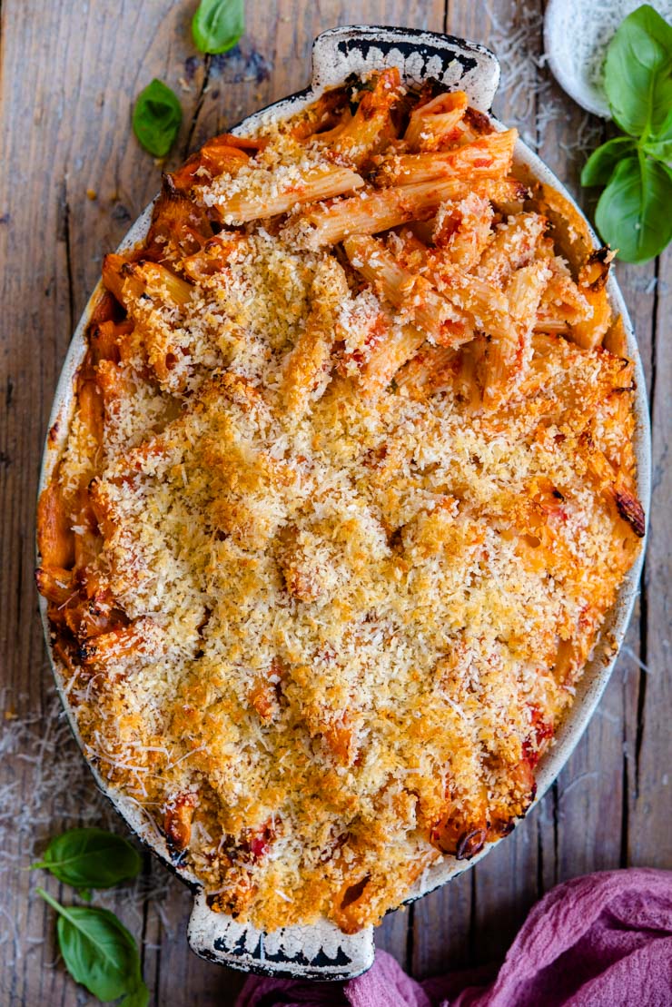 An overhead shot of pasta al forno in a baking dish