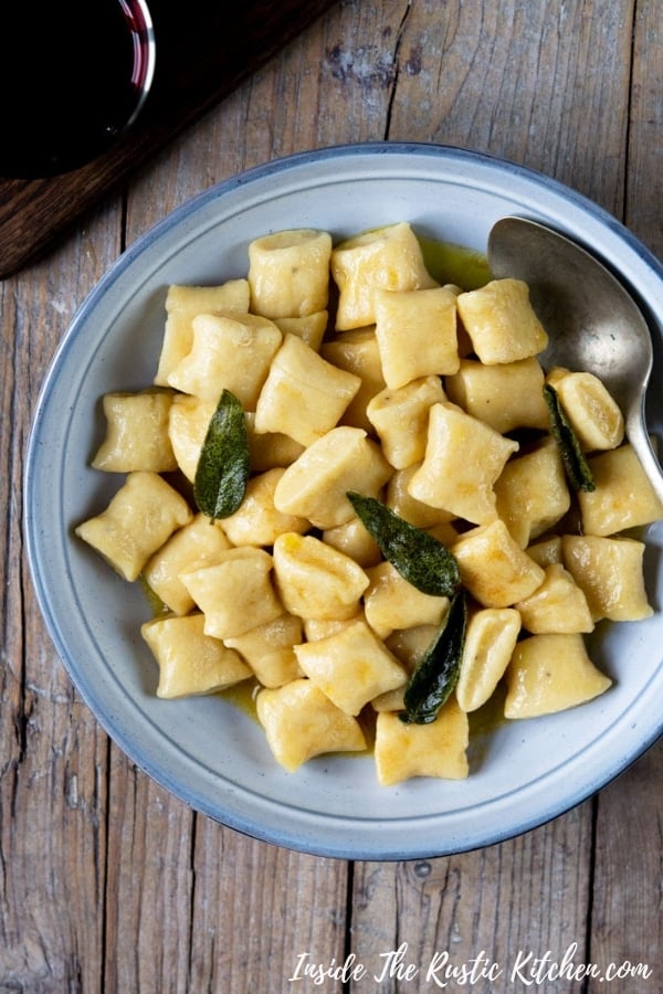 Gnocchi with Brown Butter and Sage Sauce. Light and soft gnocchi tossed with a buttery, nutty and delicious butter sauce with fragrant sage. #Insidetherustickitchen #buttersauce