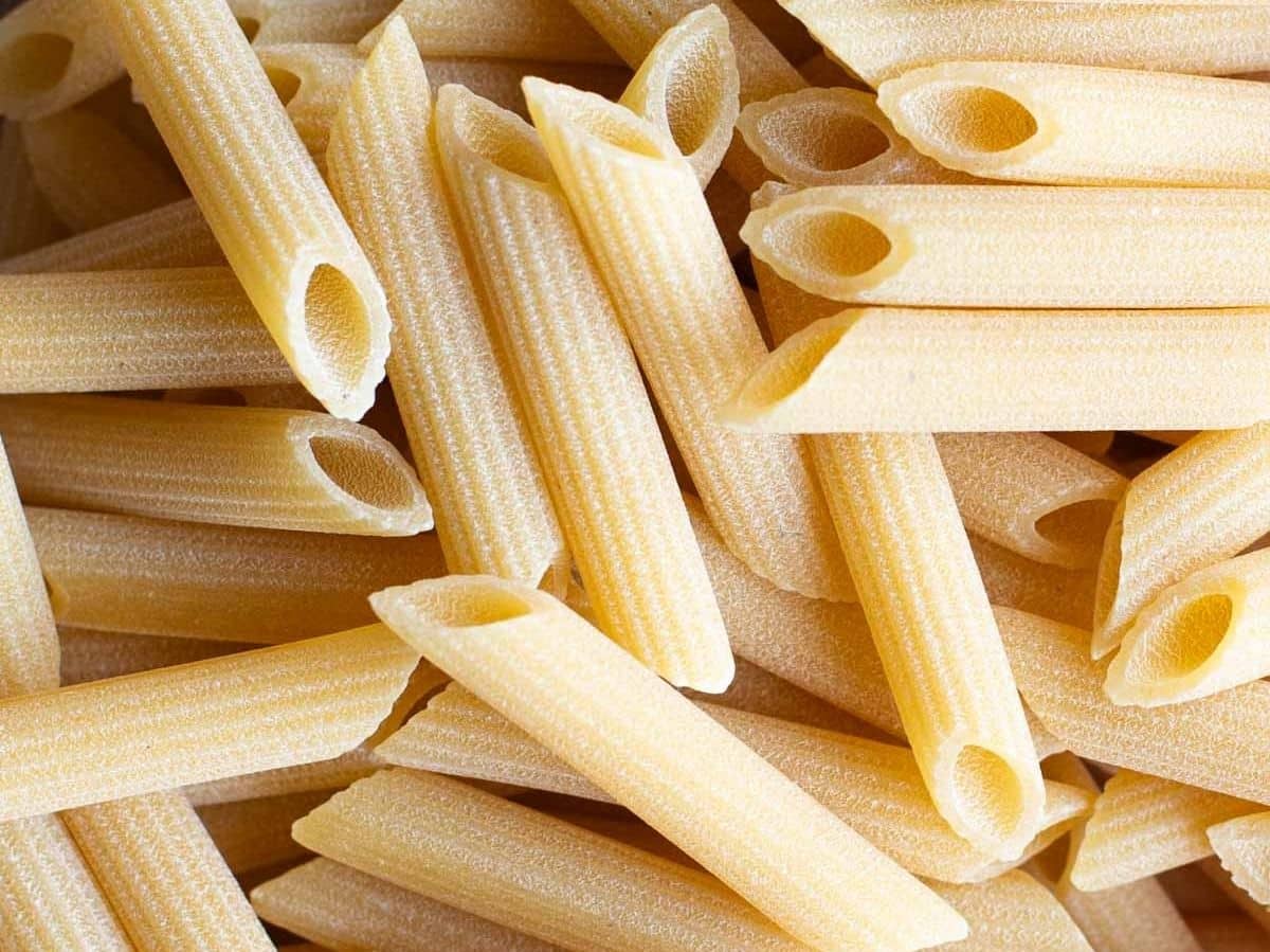 A close up of penne pasta.