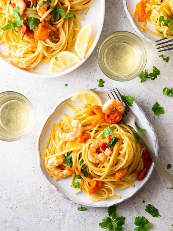 An overhead shot of shrimp linguine on a plate with parsley