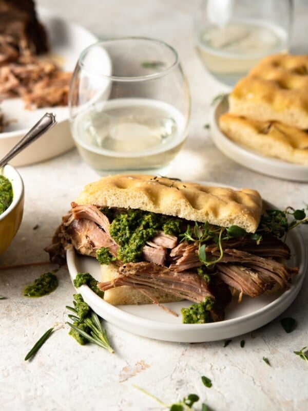 Slow cooker pulled pork shoulder on a sandwich