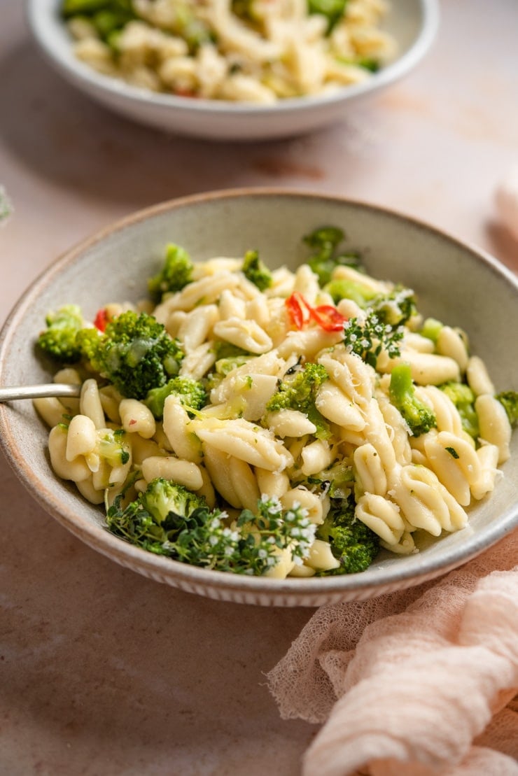 A close up of cavatelli and broccoli pasta in a bowl