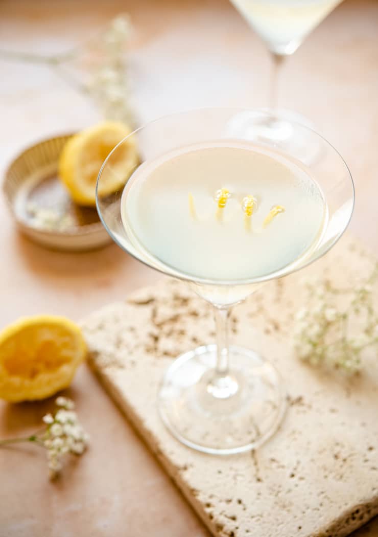 Limonello martini in a martini glass with lemon peel garnish