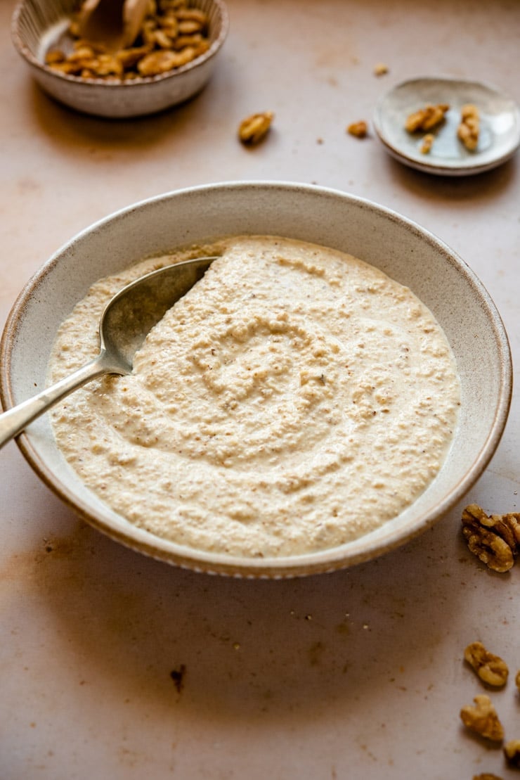 Walnut sauce, salsa di noci in a rustic bowl