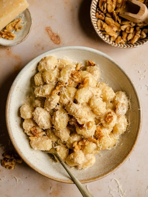 Walnut sauce in a bowl with gnocchi