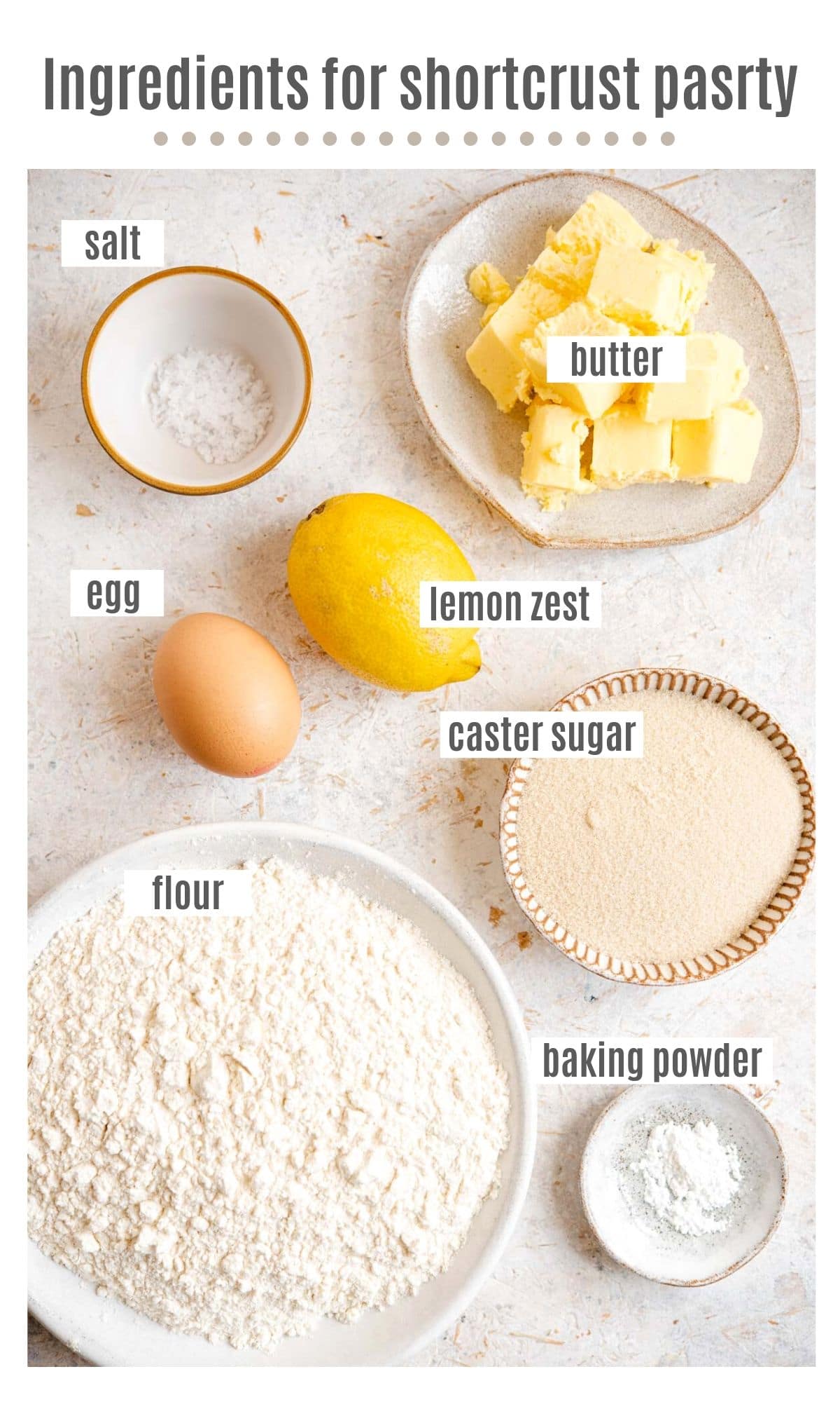 An overhead shot of ingredients you need to make shortcrust pastry with lemon zest