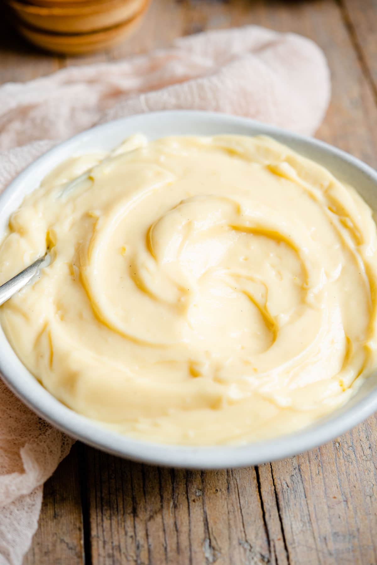 A close up of Italian pastry cream in a bowl