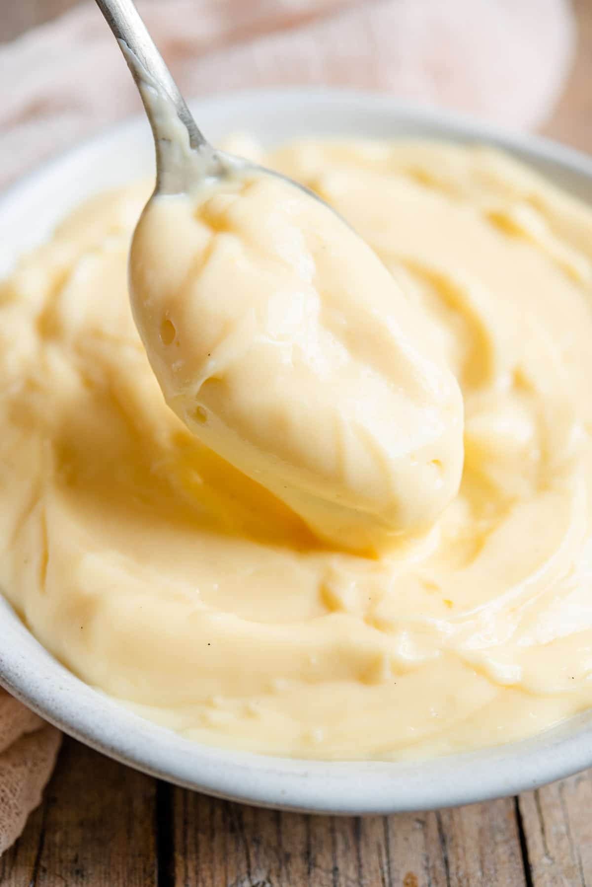 A close up of a spoonful of Italian pastry cream