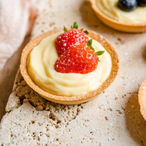 A little tart filled with Italian pastry cream and a strawberry on top