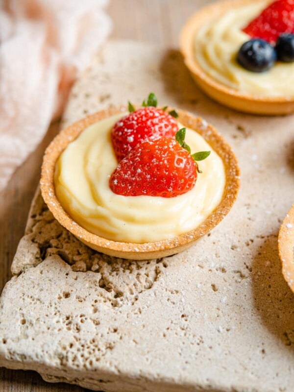 A little tart filled with Italian pastry cream and a strawberry on top