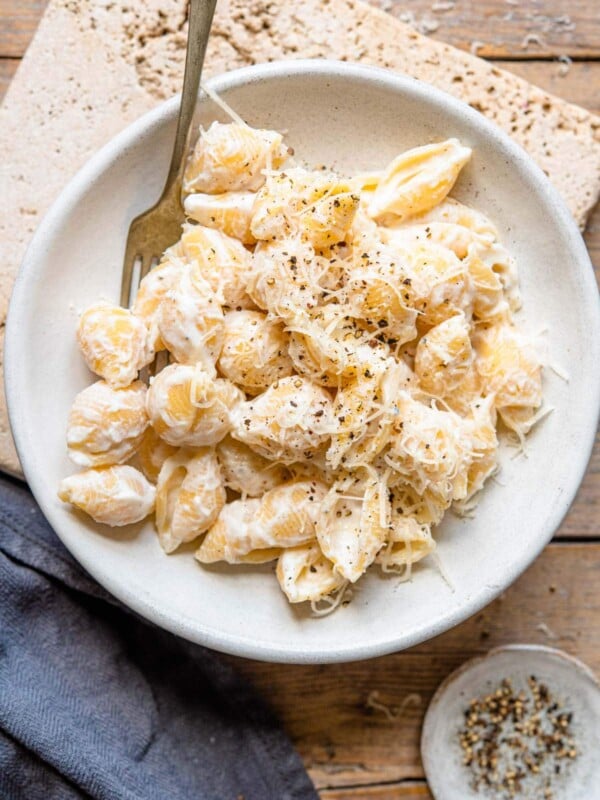 An overhead shot of ricotta pasta in a rustic bowl