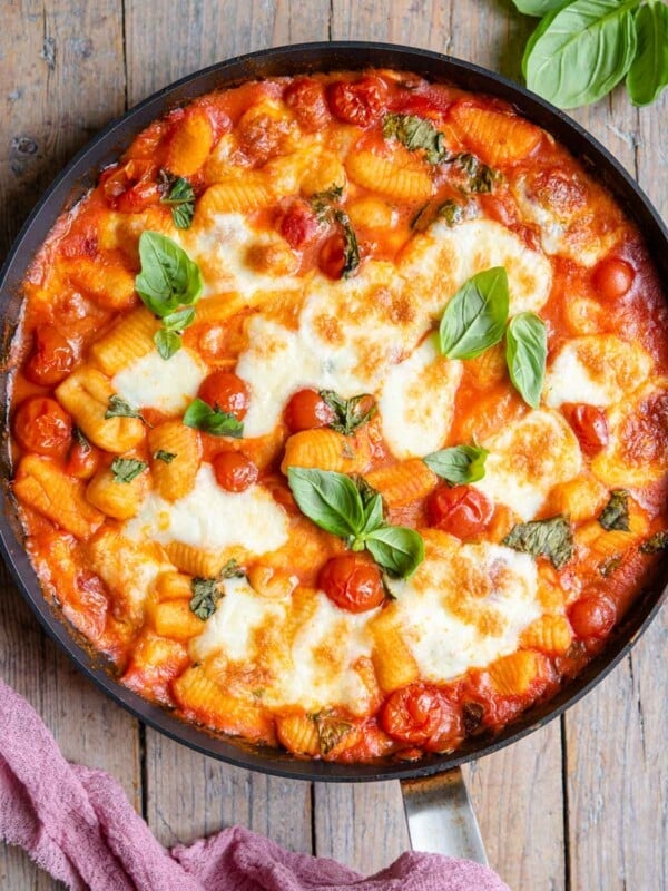 An overhead shot of baked gnocchi in a skillet