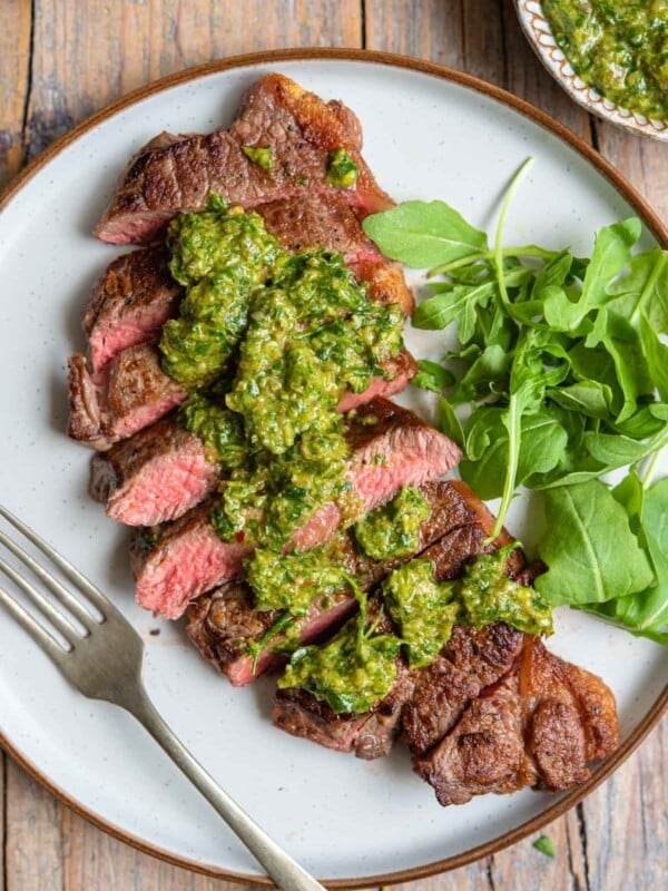Salsa verde drizzled on top of steak