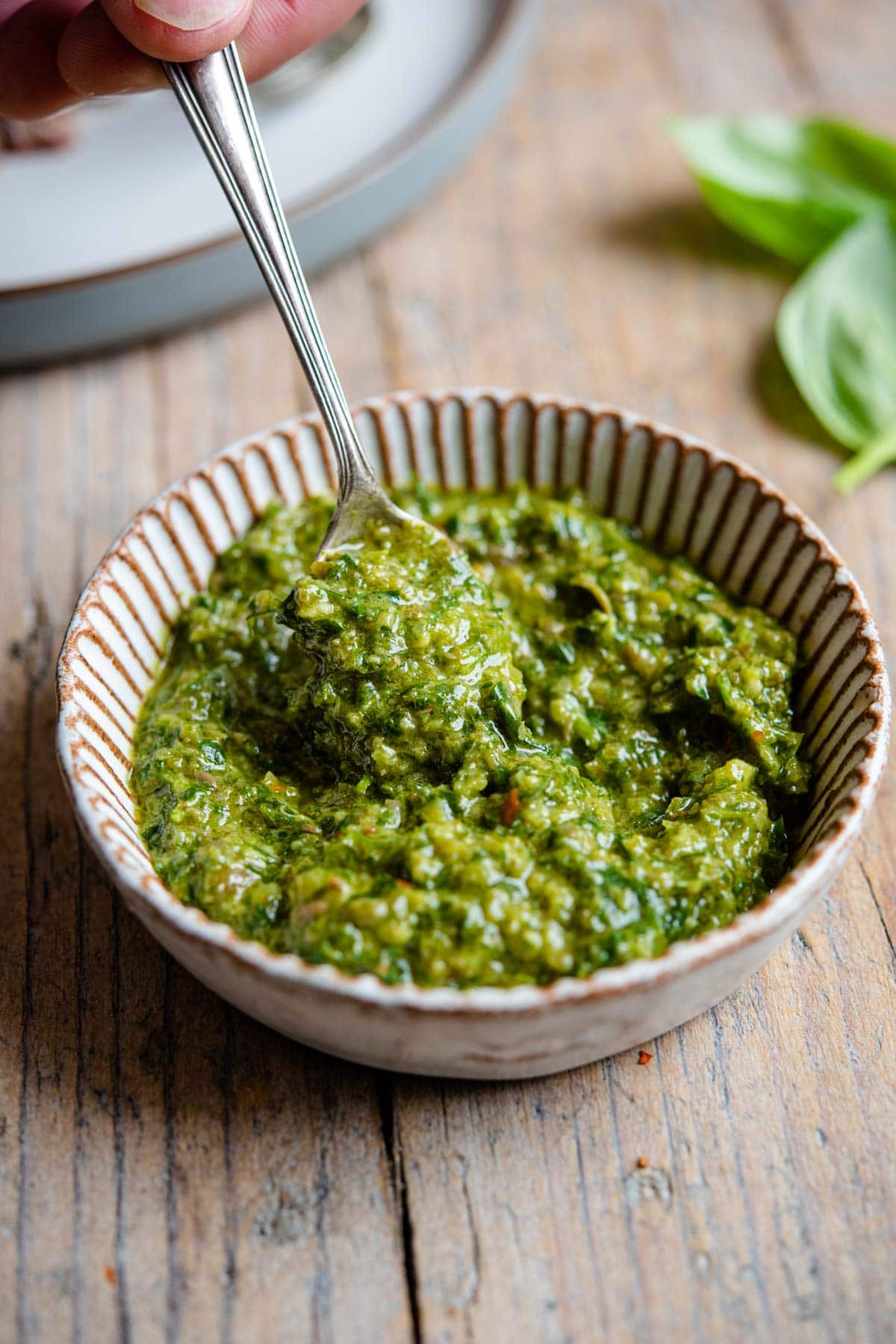 A close up of salsa verde in a ramekin