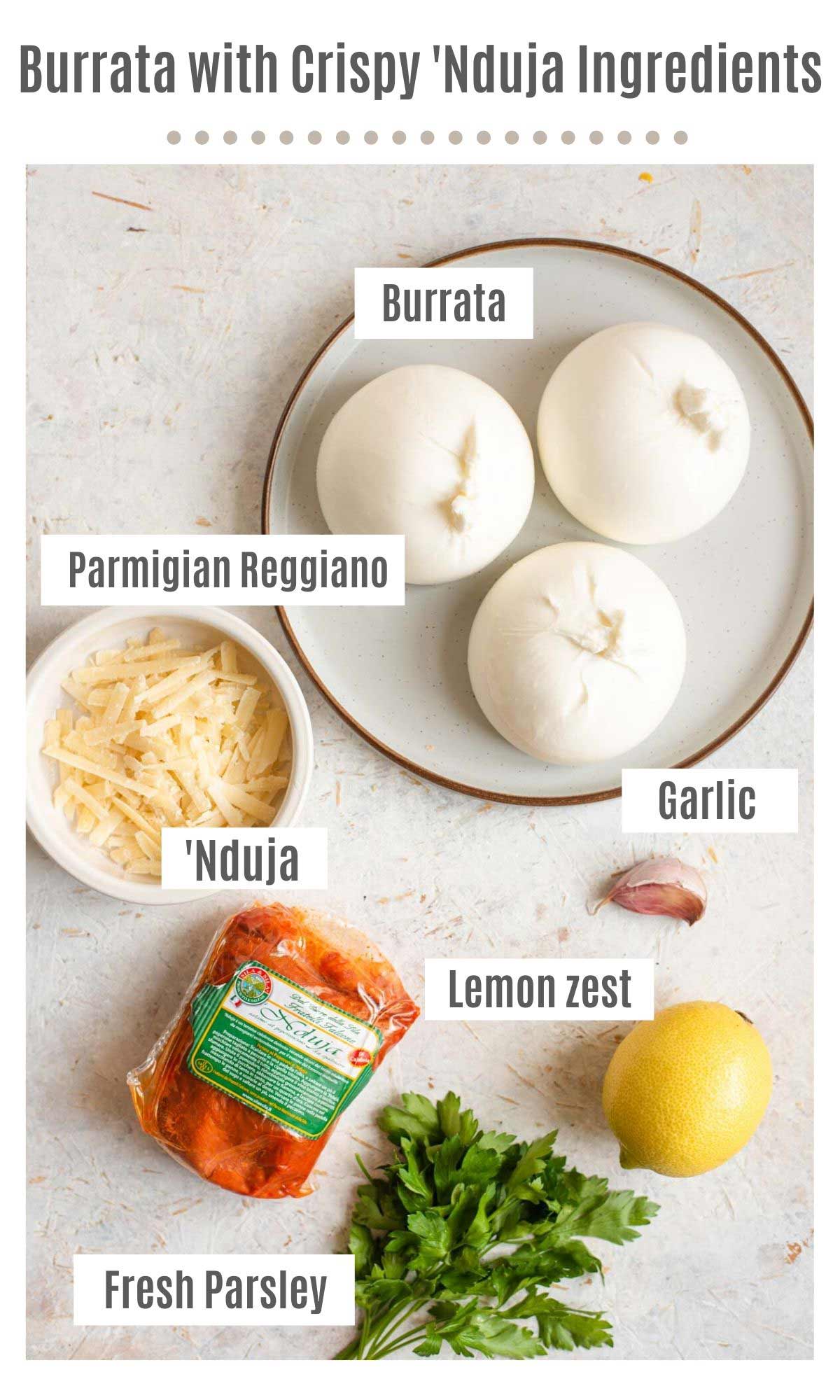 An overhead shot of all the ingredients you need to make Burrata with 'Nduja and gremolata