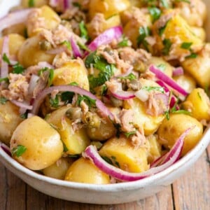 A close up of a tuna potato salad in a bowl