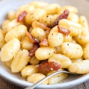 A close up of gnocchi carbonara