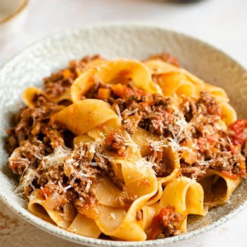 Lamb ragu a pappardelle pasta in a bowl