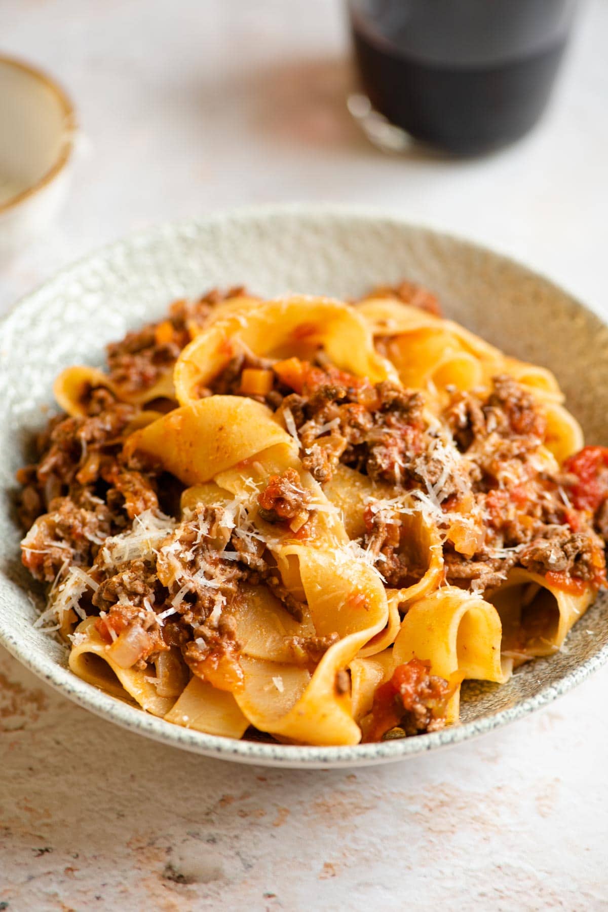 Lamb ragu a pappardelle pasta in a bowl