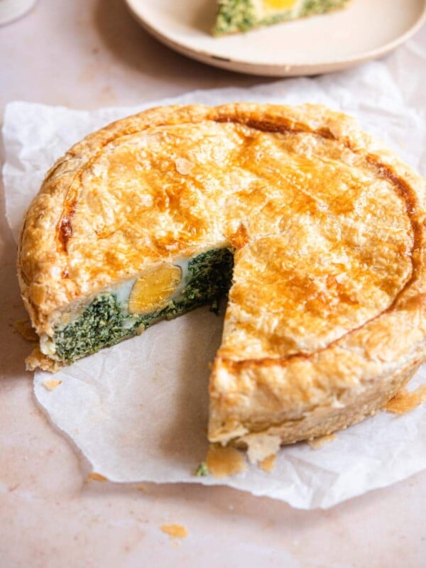 Torta Pasqualina with a slice cut out
