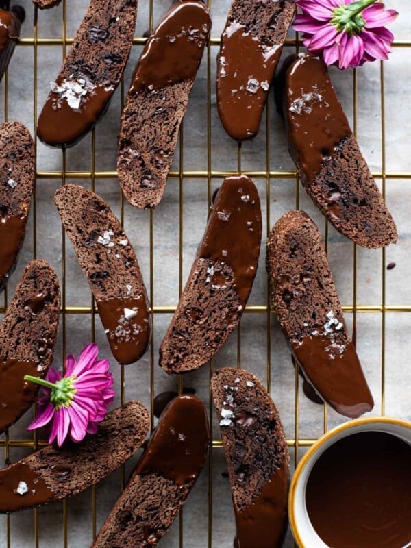 An overhead shot of chocolate biscotti on a cooling rack