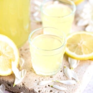 close up of small glasses of homemade limoncello