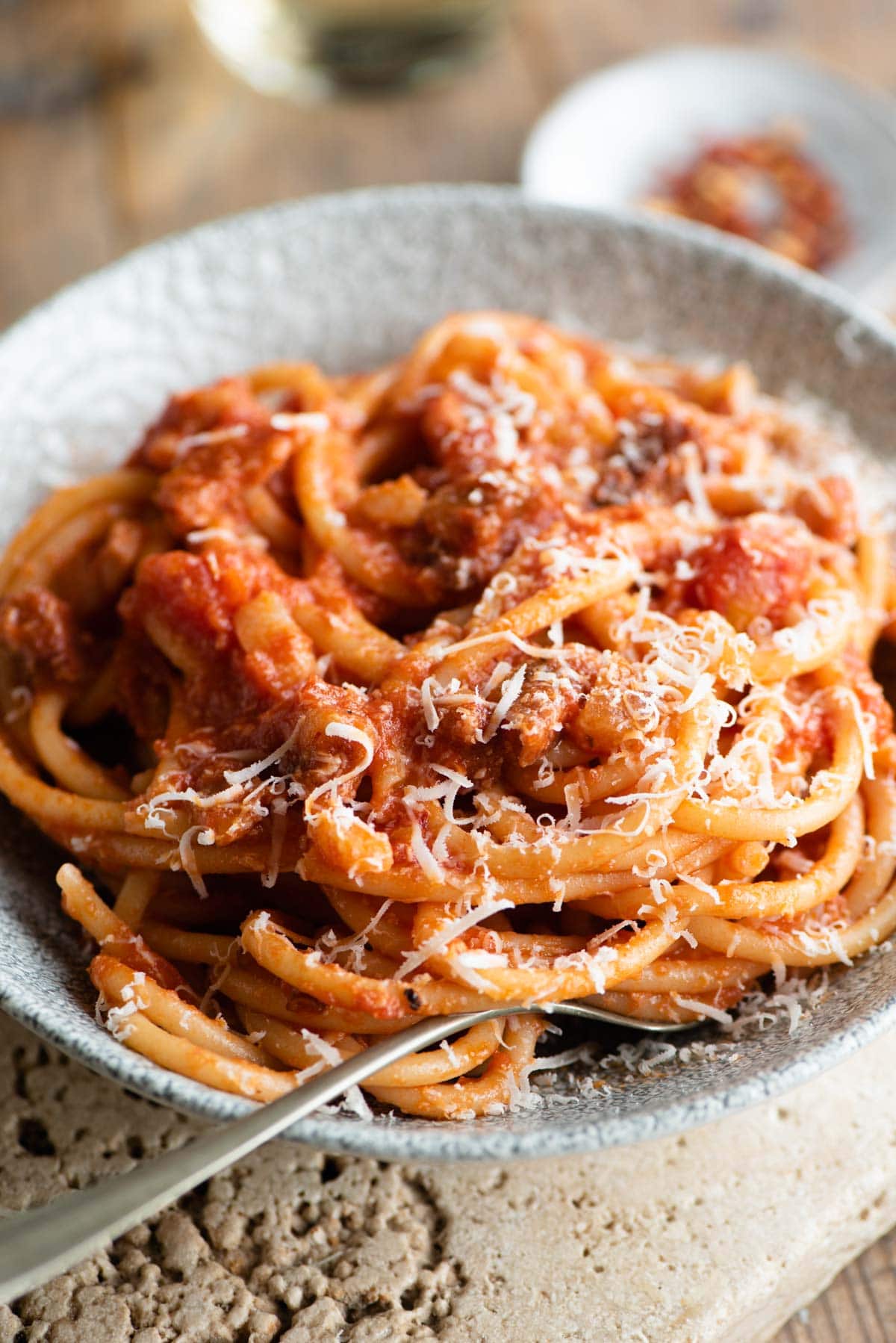 A close up of Bucatini all'Amatriciana in a bowl