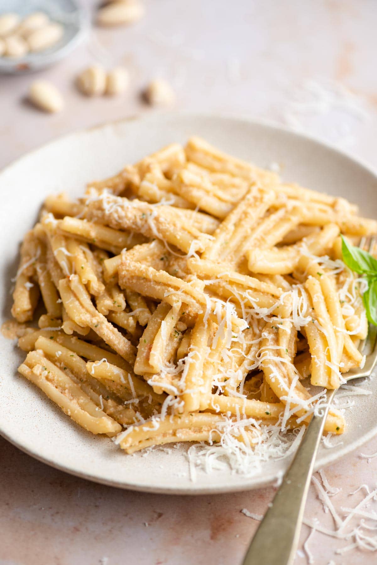 A close up of pesto alla trapanese mixed with pasta