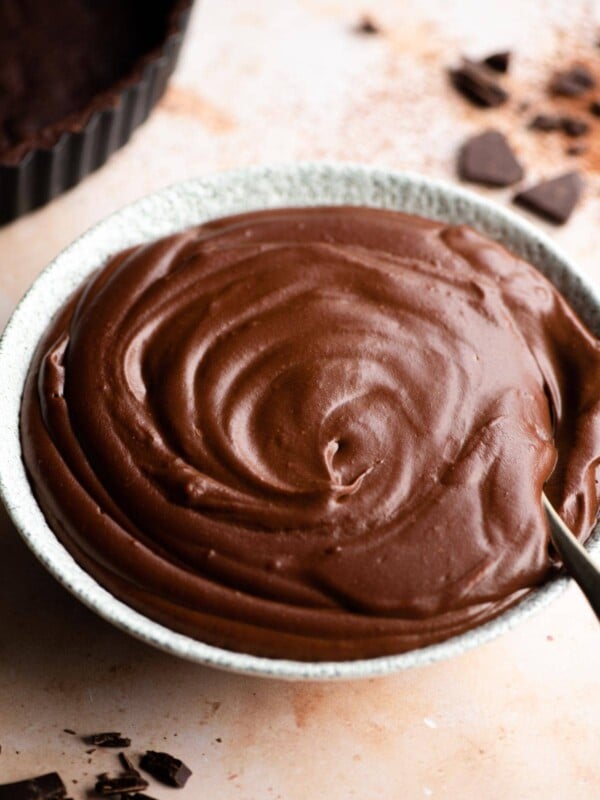 A close up of a bowl of chocolate pastry cream